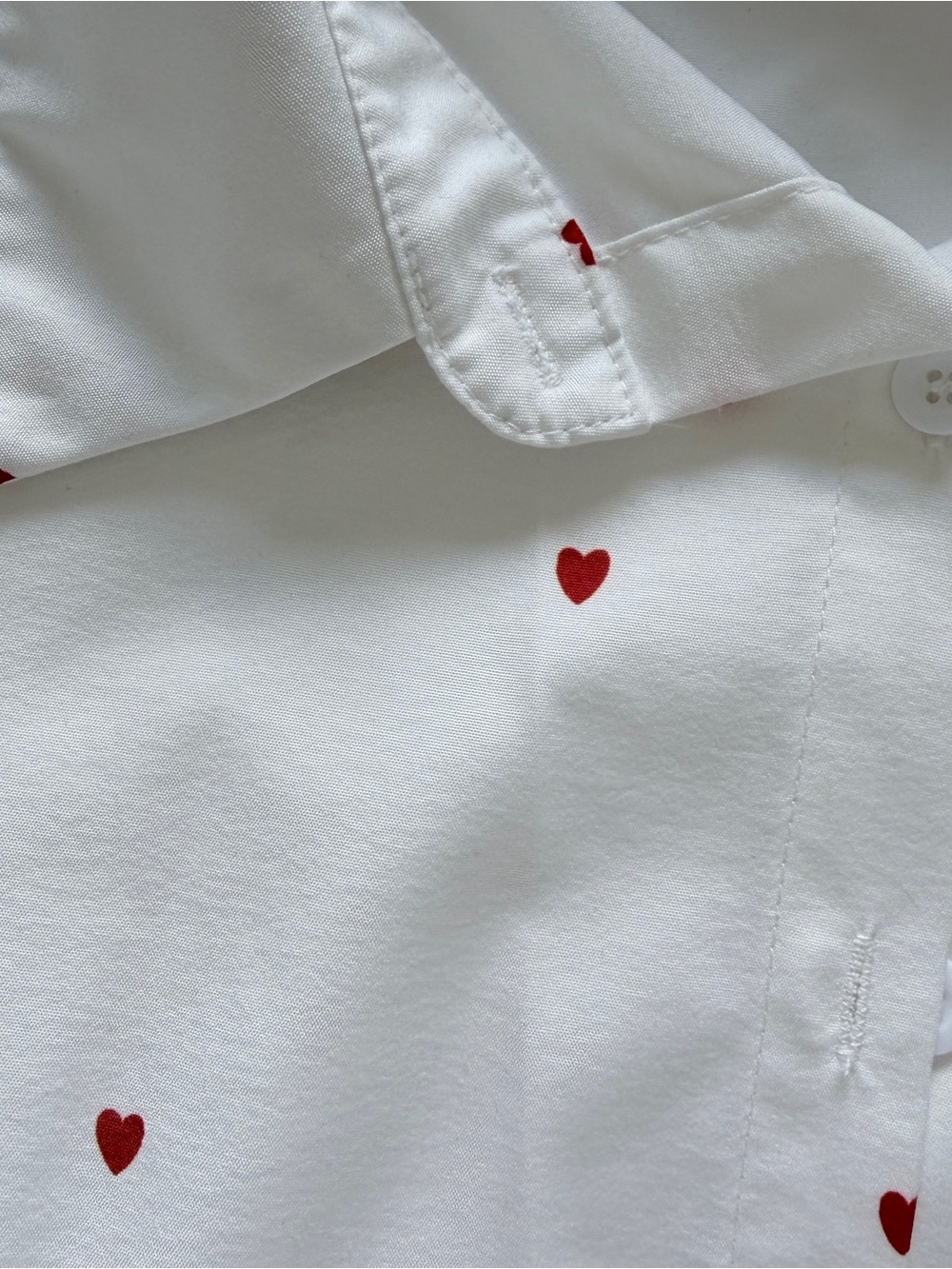 White Button-Down Shirt with Red Heart Print